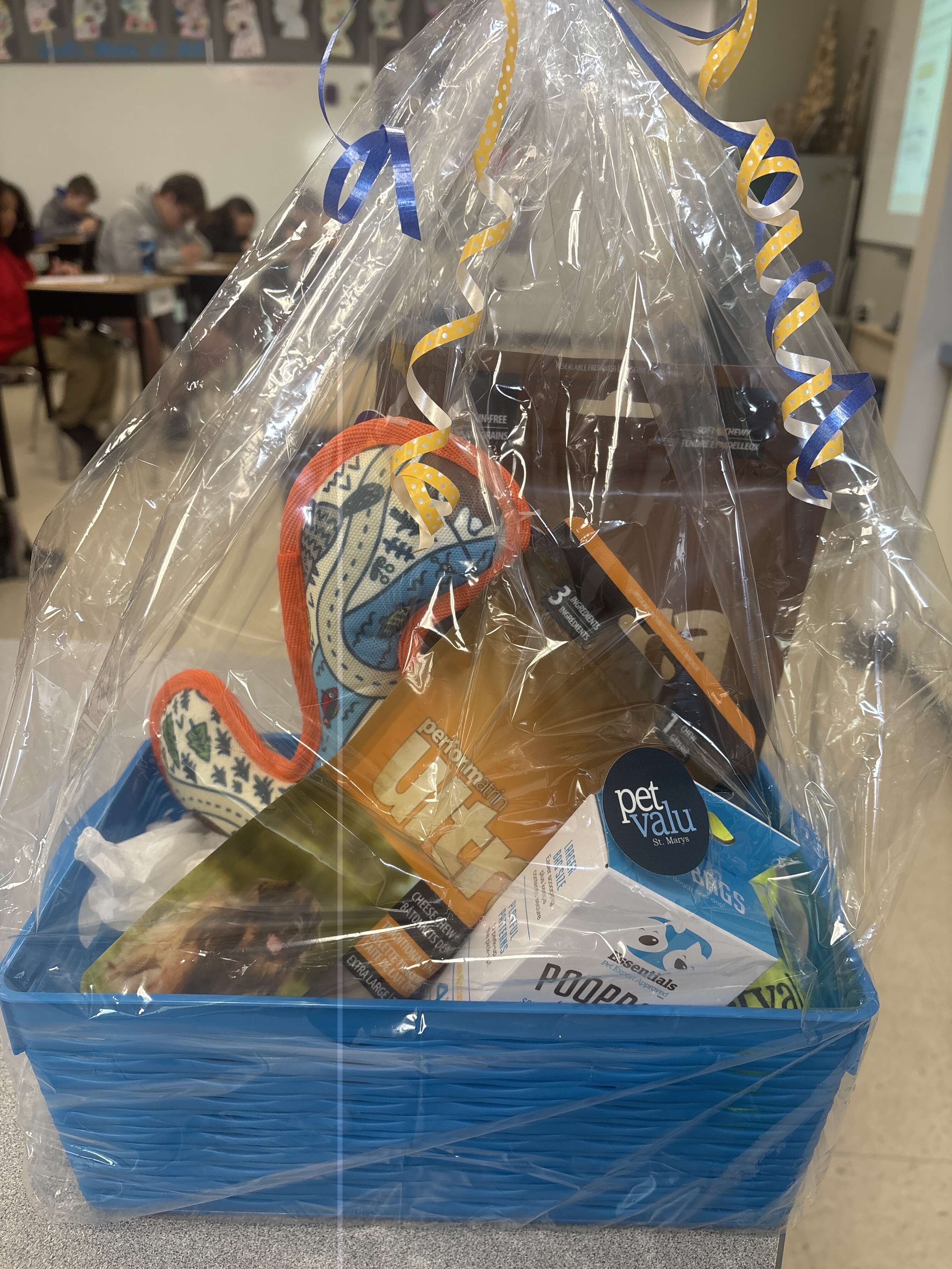 Pet Valu Gift Basket - Includes Performatrin Ultra Dog Chewy Sticks, Performatrin Cheese Chew Stick, Poop bags, two tennis balls, JUMP Squeak & Crinkle Dog Toy