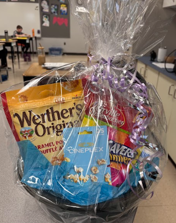 Movie Night Package includes $25 Cineplex Gift Card, Werther’s Original, Gummy Life Savers, Smartfood Popcorn, Orville Redenbacher Popcorn (6 bags) and Kernels Salt & Vinegar Seasoning &1L Coca-Cola